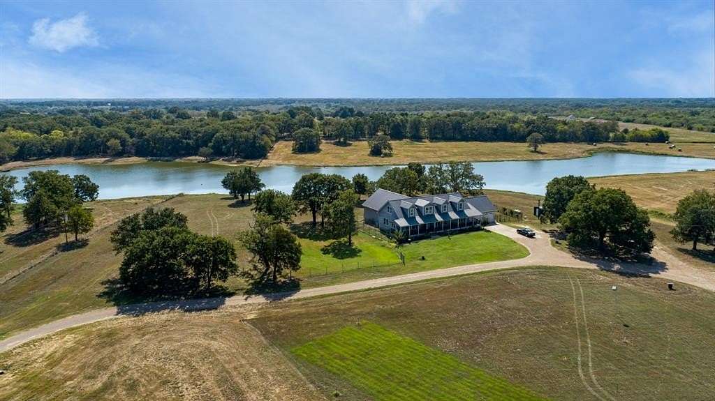 90 Acres of Agricultural Land with Home for Sale in Kemp, Texas