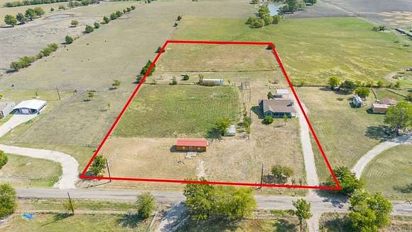 5.003 Acres of Land with Home for Sale in Greenville, Texas