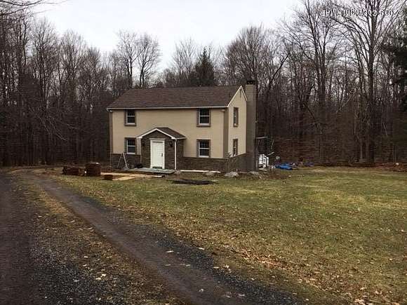 4.2 Acres of Residential Land with Home for Sale in Pocono Lake, Pennsylvania