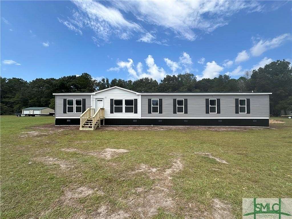 5.78 Acres of Residential Land with Home for Sale in Ludowici, Georgia