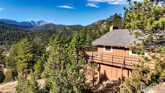 2.3 Acres of Residential Land with Home for Sale in Estes Park, Colorado