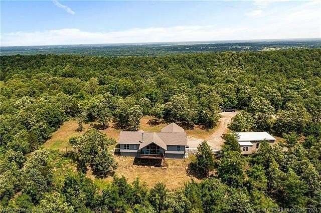 5 Acres of Residential Land with Home for Sale in Pocola, Oklahoma