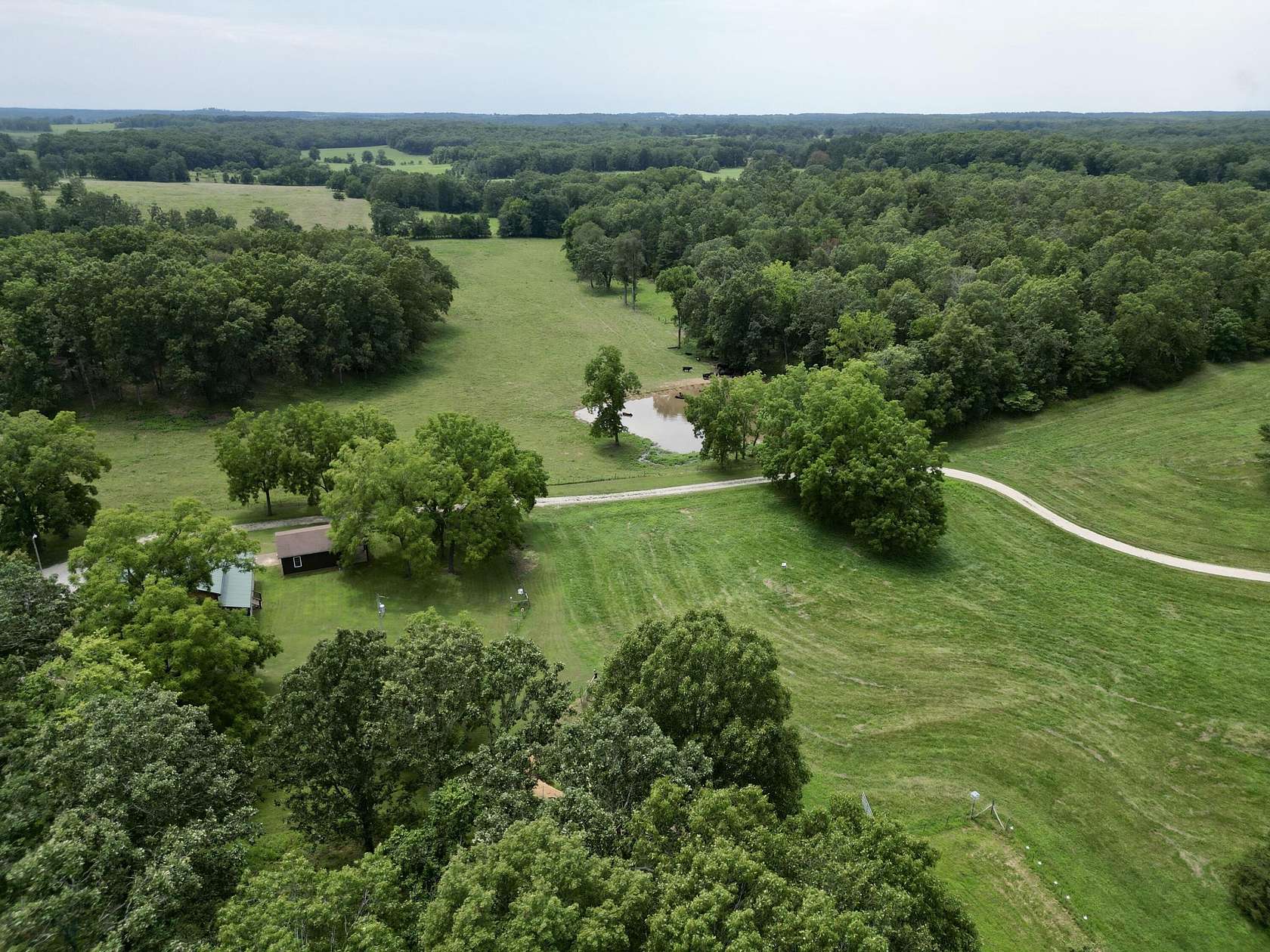 117 Acres of Land with Home for Sale in Birch Tree, Missouri