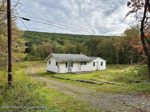 5.39 Acres of Residential Land with Home for Sale in Scott Township, Pennsylvania