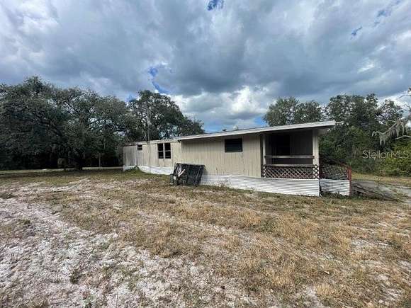 5.03 Acres of Land with Home for Sale in Spring Hill, Florida