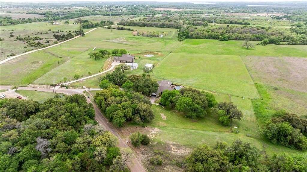 10 Acres of Residential Land with Home for Lease in Aurora, Texas