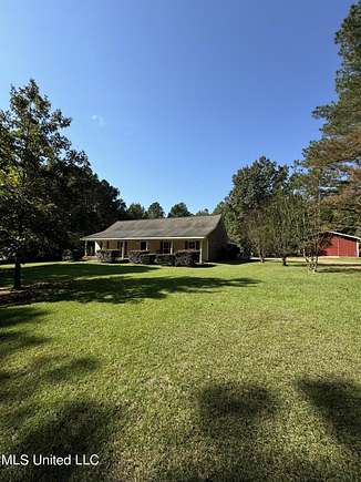 10.22 Acres of Land with Home for Sale in Flora, Mississippi