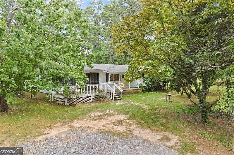 5.5 Acres of Residential Land with Home for Sale in Woodstock, Georgia