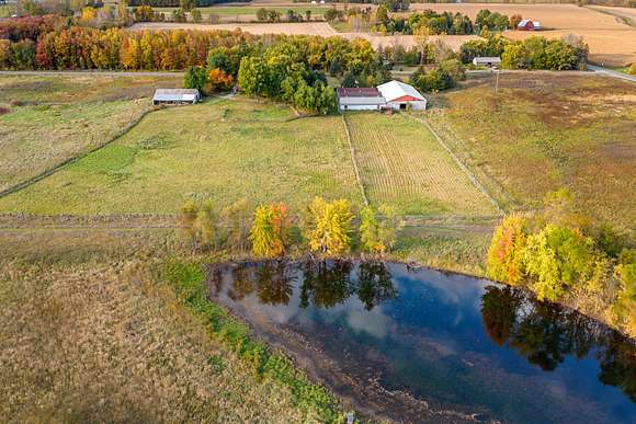 56.44 Acres of Agricultural Land with Home for Sale in Perry, Michigan