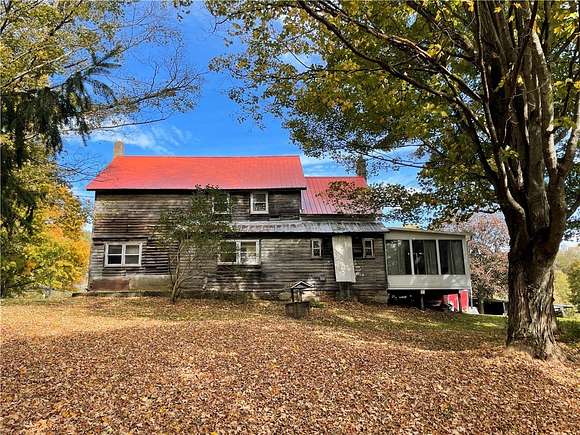 56.33 Acres of Agricultural Land with Home for Sale in Hamilton, New York