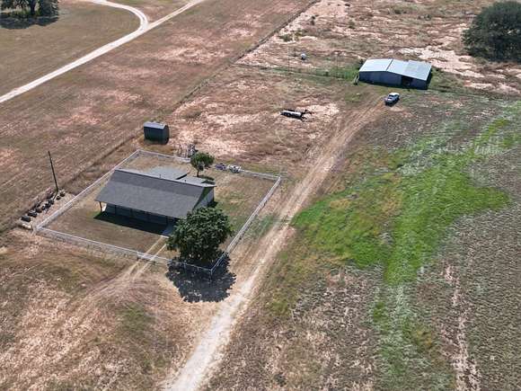 15.1 Acres of Recreational Land with Home for Sale in Stockdale, Texas