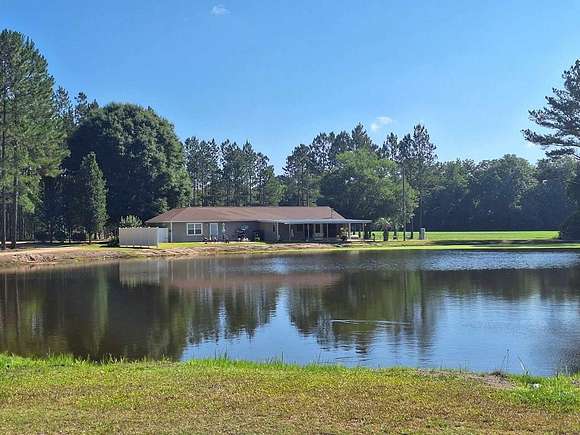 7.81 Acres of Land with Home for Sale in Hazlehurst, Georgia