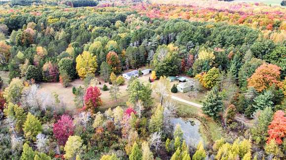 10 Acres of Recreational Land with Home for Sale in Walkerville, Michigan