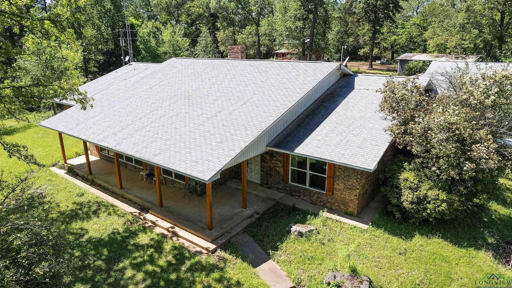 15.3 Acres of Recreational Land with Home for Sale in Henderson, Texas