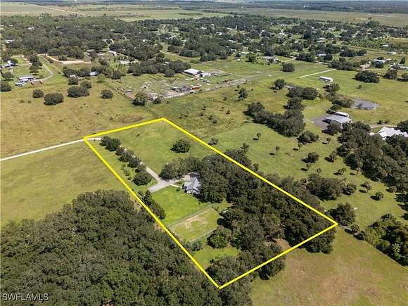 4.89 Acres of Residential Land with Home for Sale in Fort Denaud, Florida