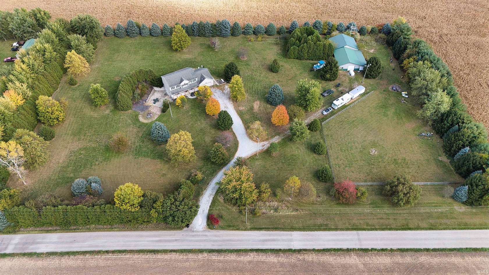 5 Acres of Residential Land with Home for Sale in Syracuse, Indiana