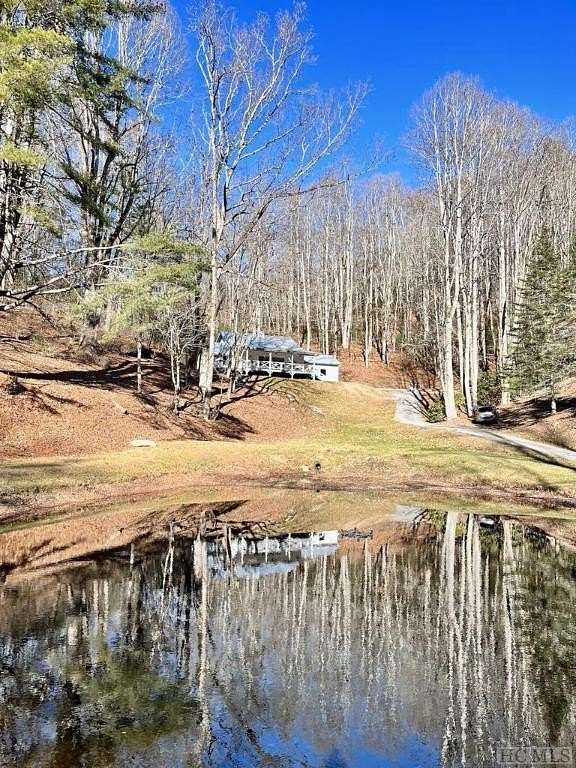 4.76 Acres of Residential Land with Home for Sale in Scaly Mountain, North Carolina