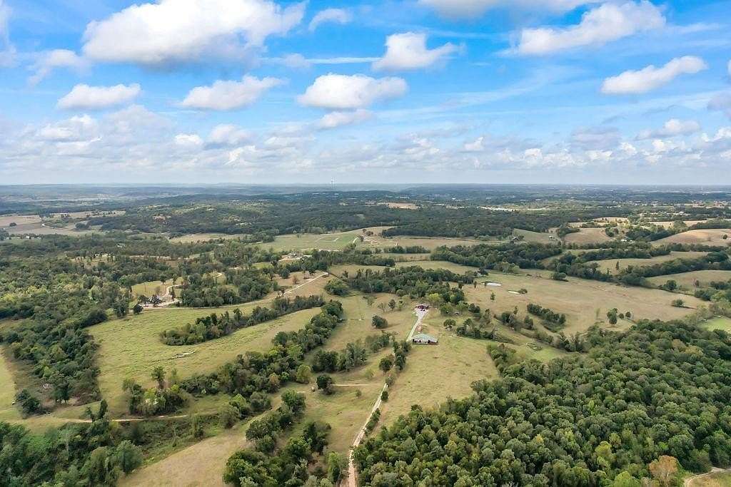 201.7 Acres of Land with Home for Sale in Gentry, Arkansas