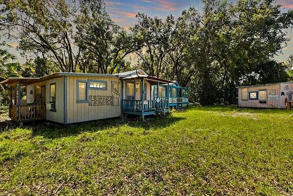 19.4 Acres of Recreational Land with Home for Sale in Chiefland, Florida