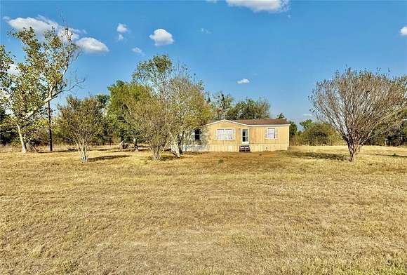 3 Acres of Residential Land with Home for Sale in Mexia, Texas