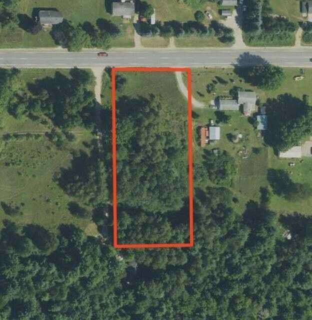 1.38 Acres of Commercial Land for Sale in Howard City, Michigan