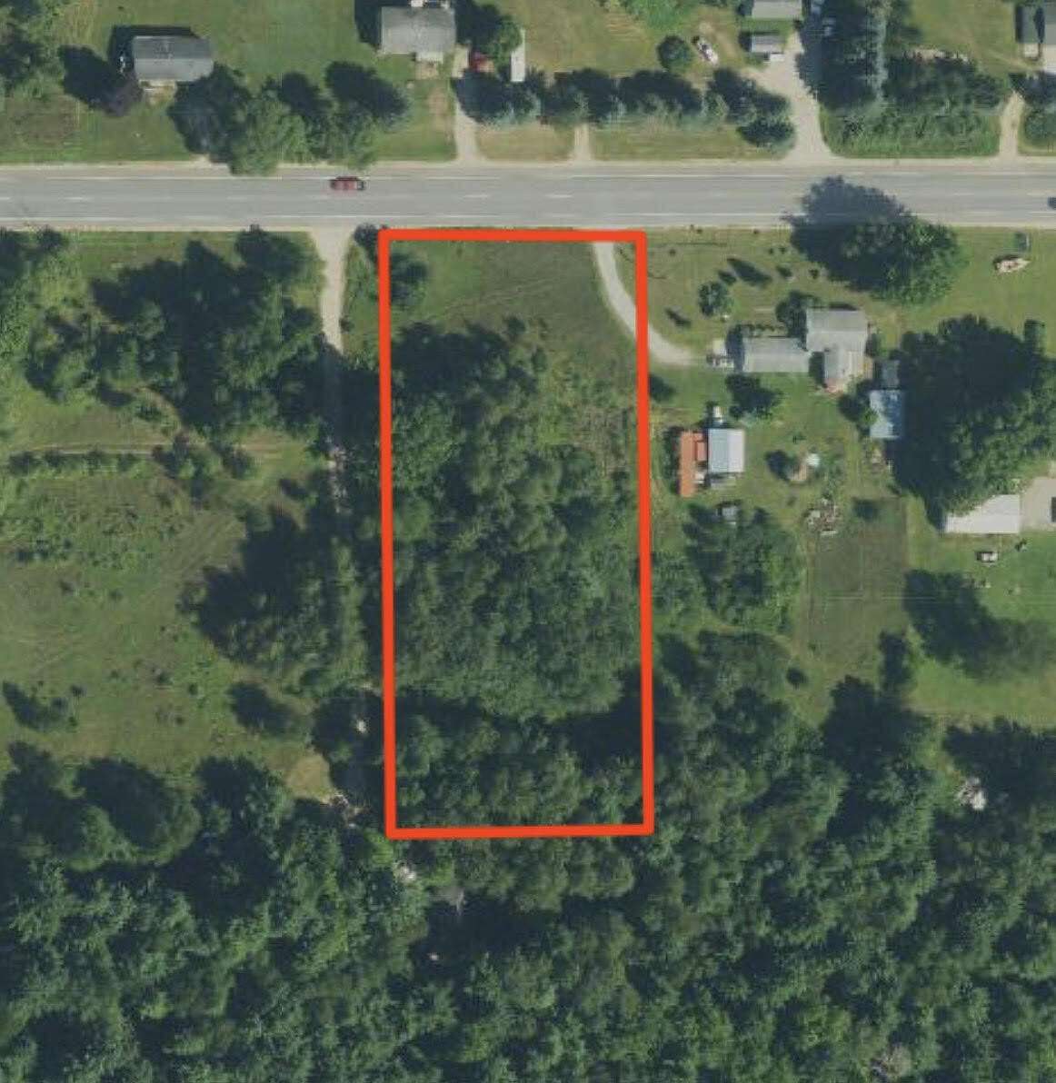 1.38 Acres of Commercial Land for Sale in Howard City, Michigan