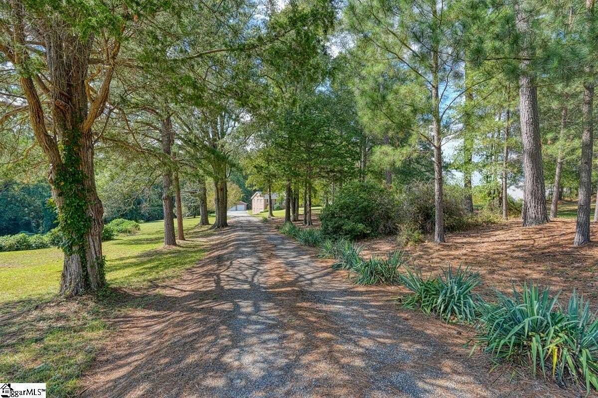 5.58 Acres of Residential Land with Home for Sale in Roebuck, South Carolina