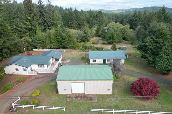 2.99 Acres of Residential Land with Home for Sale in North Bend, Oregon