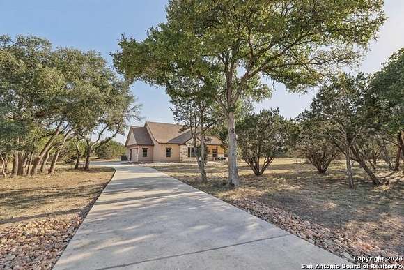 2.02 Acres of Residential Land with Home for Sale in Pipe Creek, Texas