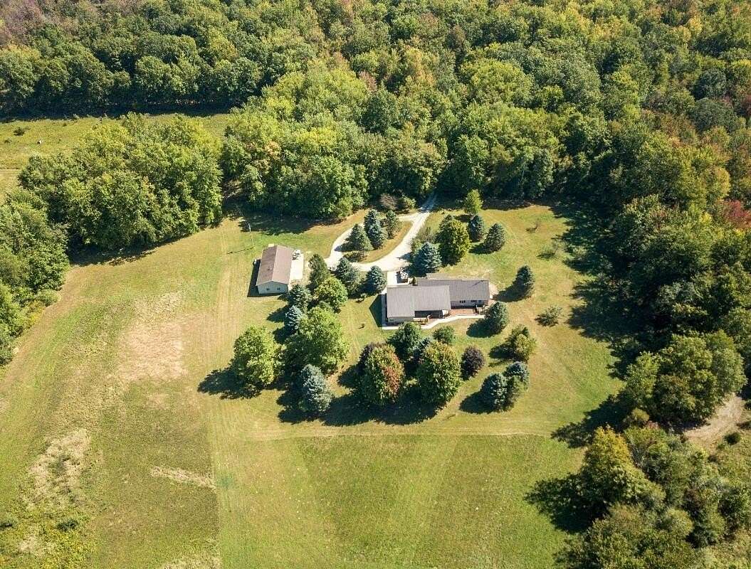 60 Acres of Land with Home for Sale in North Adams, Michigan