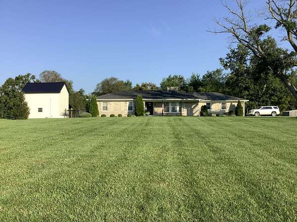 54 Acres of Land with Home for Sale in Versailles, Kentucky