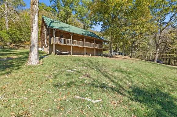 6.5 Acres of Residential Land with Home for Sale in Pleasant Shade, Tennessee