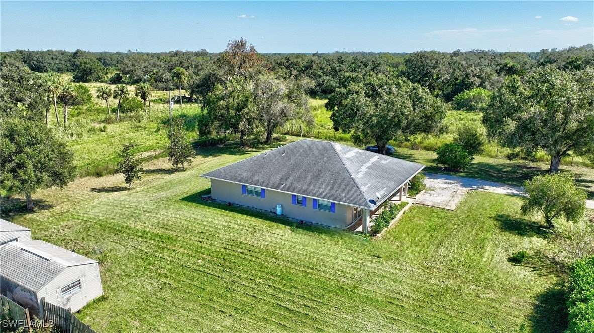 9.838 Acres of Residential Land with Home for Sale in Alva, Florida