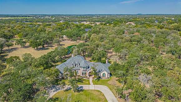 8.68 Acres of Land with Home for Sale in Bartonville, Texas