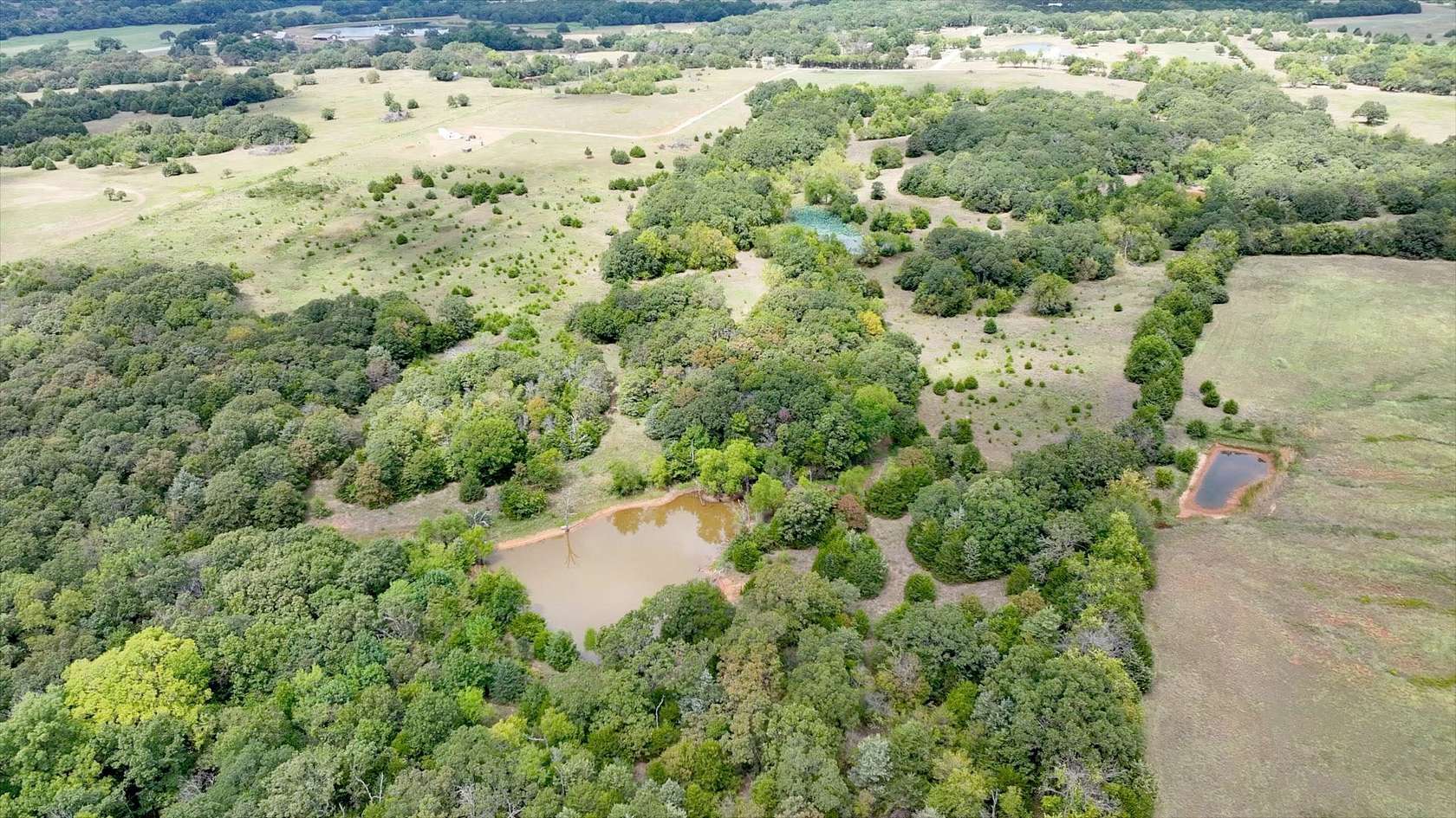 25.98 Acres of Recreational Land & Farm for Auction in Meeker, Oklahoma