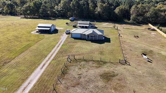 9.33 Acres of Land with Home for Sale in Carthage, North Carolina