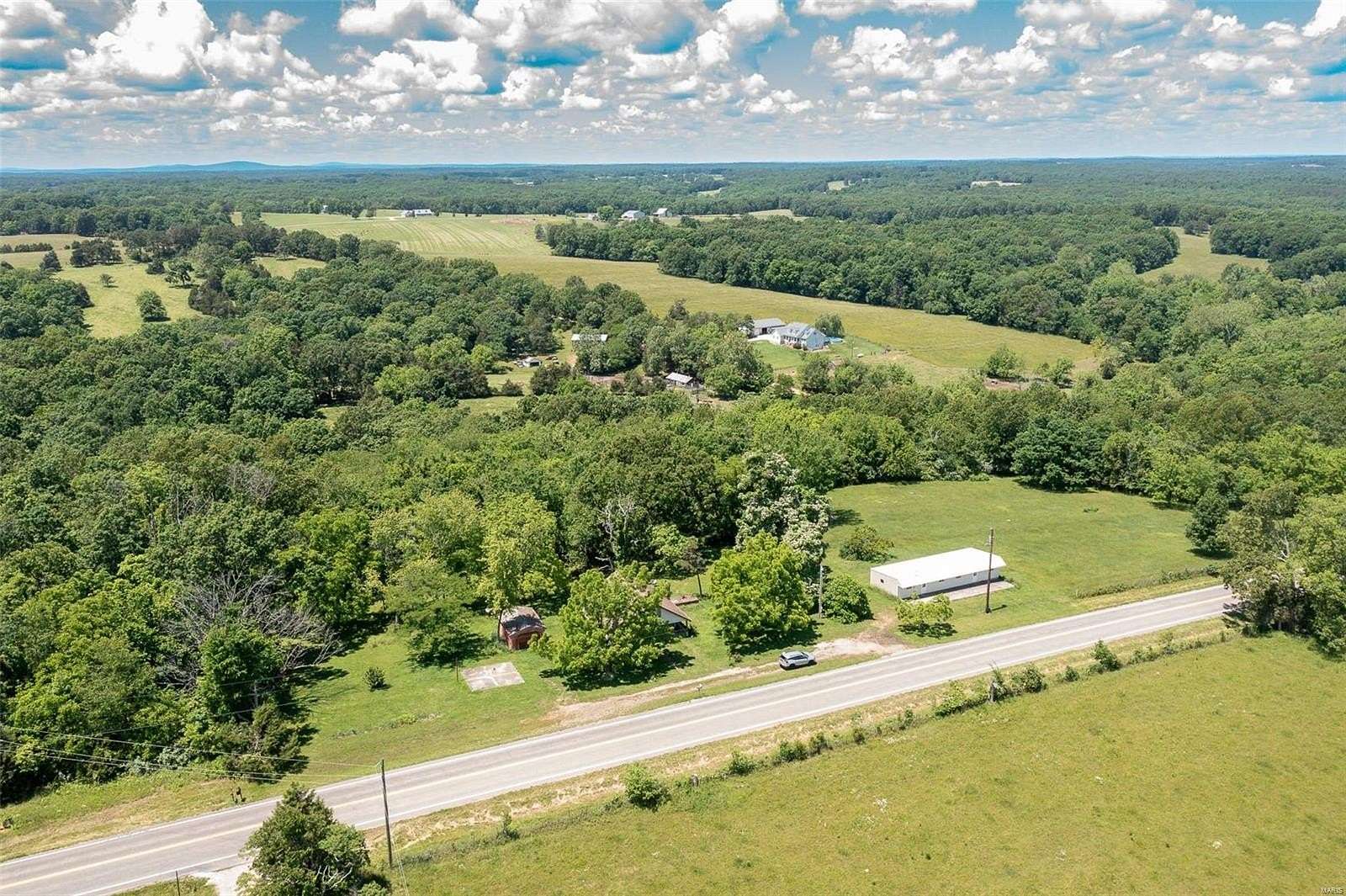 8.63 Acres of Residential Land with Home for Sale in Marble Hill, Missouri