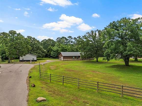 5.41 Acres of Residential Land with Home for Sale in Scroggins, Texas