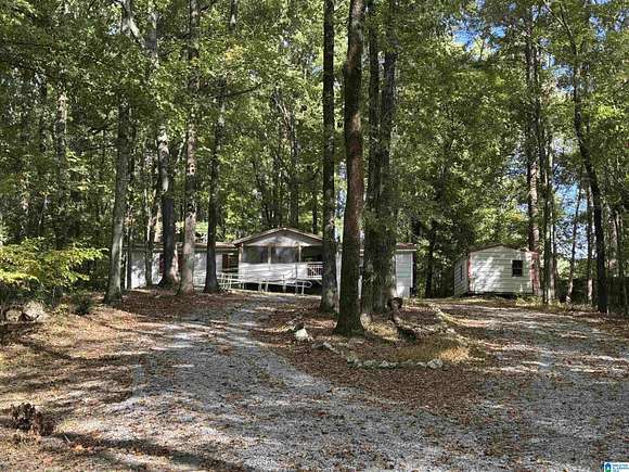 5.3 Acres of Residential Land with Home for Sale in Maylene, Alabama