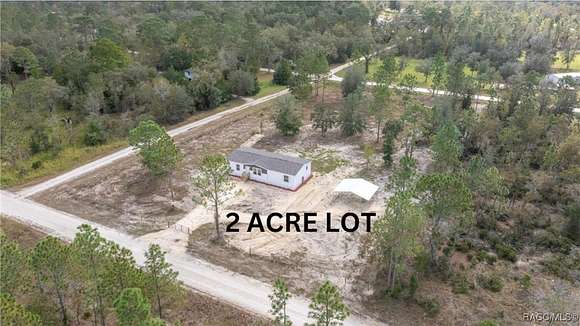 2 Acres of Residential Land with Home for Sale in Williston, Florida