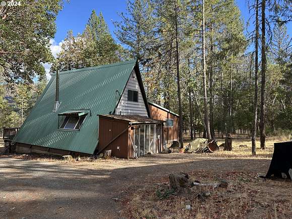 25.21 Acres of Recreational Land with Home for Sale in Jacksonville, Oregon