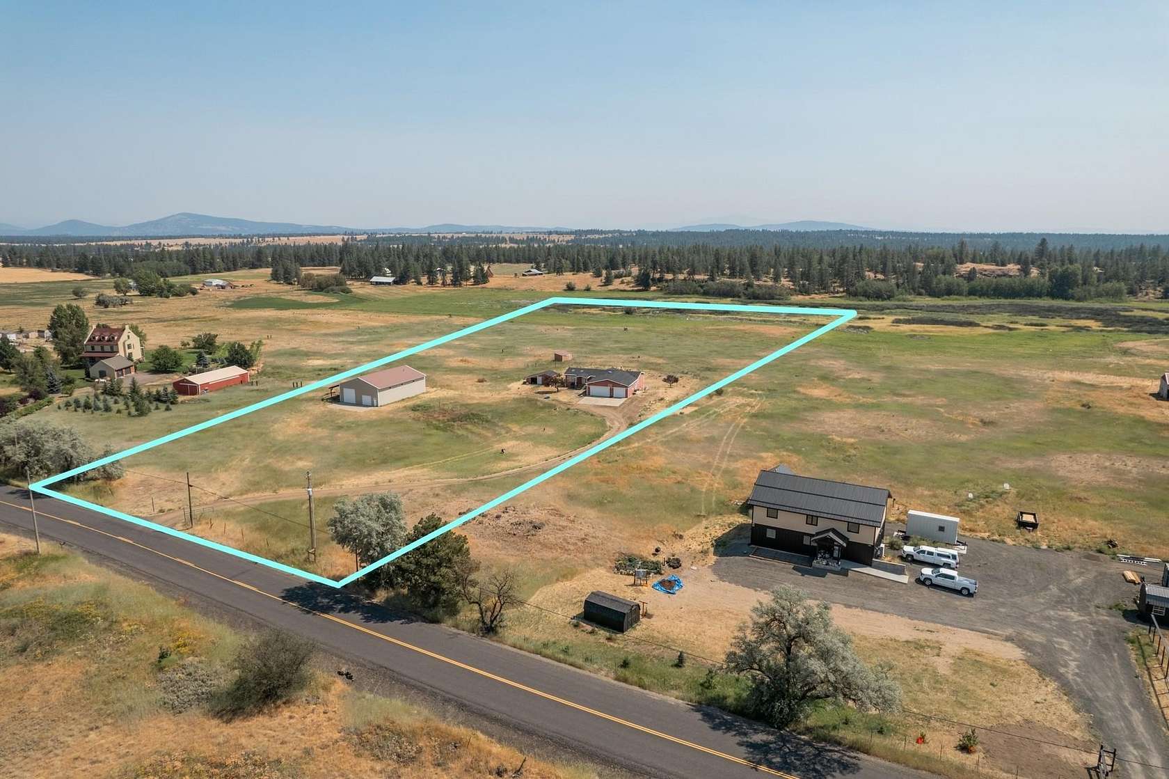 9.9 Acres of Residential Land with Home for Sale in Reardan, Washington