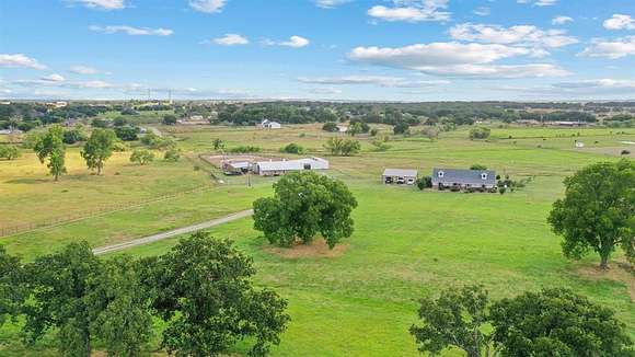 15.2 Acres of Land with Home for Sale in Springtown, Texas