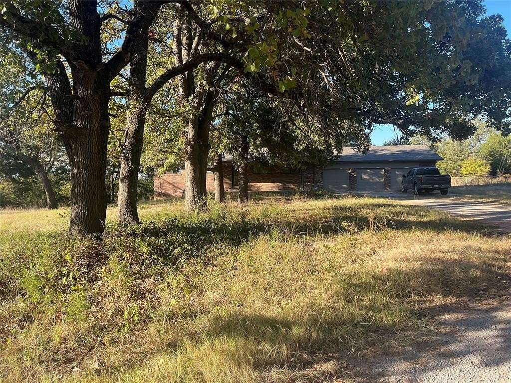 54.89 Acres of Land with Home for Sale in Asher, Oklahoma