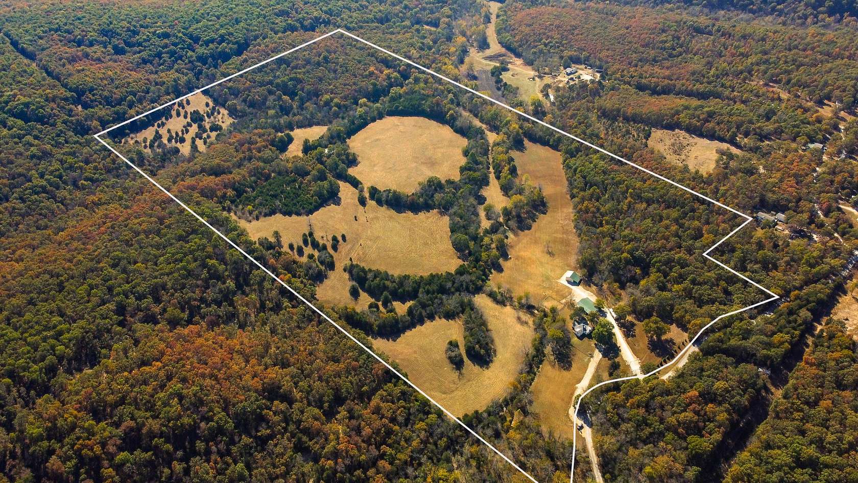 75 Acres of Land with Home for Sale in Pleasant Hope, Missouri