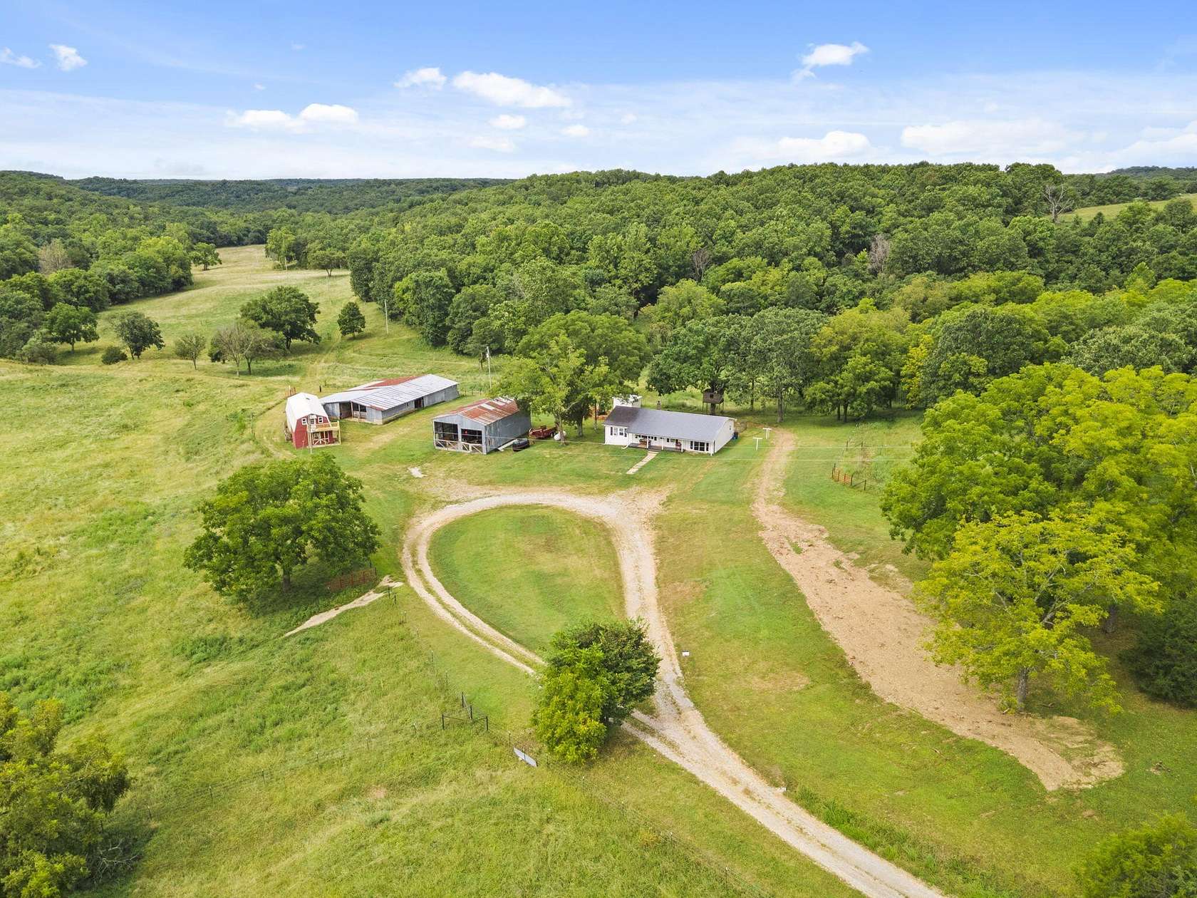 61.57 Acres of Land with Home for Sale in Squires, Missouri