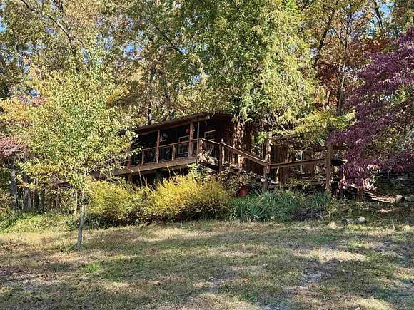 68 Acres of Land with Home for Sale in Melbourne, Arkansas