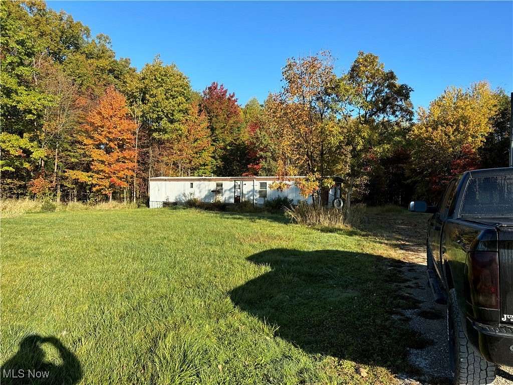 5.019 Acres of Residential Land with Home for Sale in Jefferson, Ohio