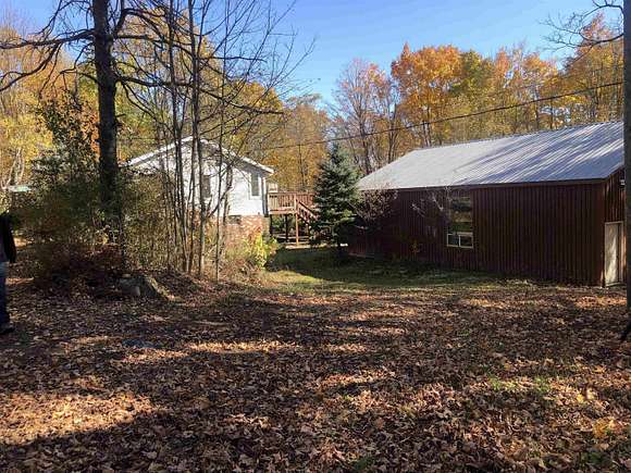 20 Acres of Recreational Land with Home for Sale in Canton, New York