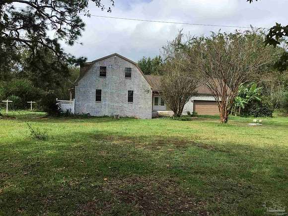 15.18 Acres of Land with Home for Sale in Jay, Florida